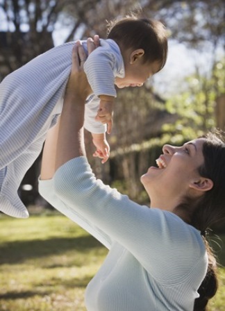 Mom holding baby up